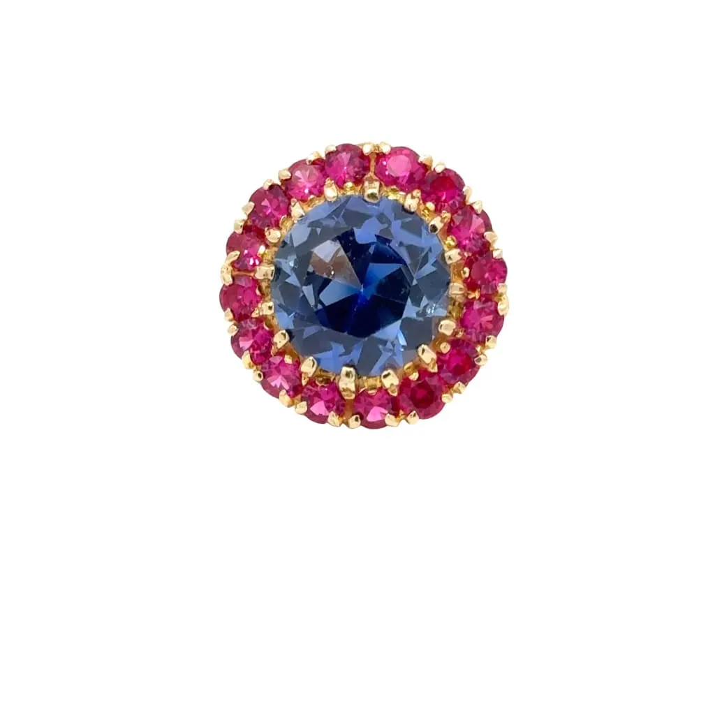 Blue And Red Gemstones On A Gold Ring