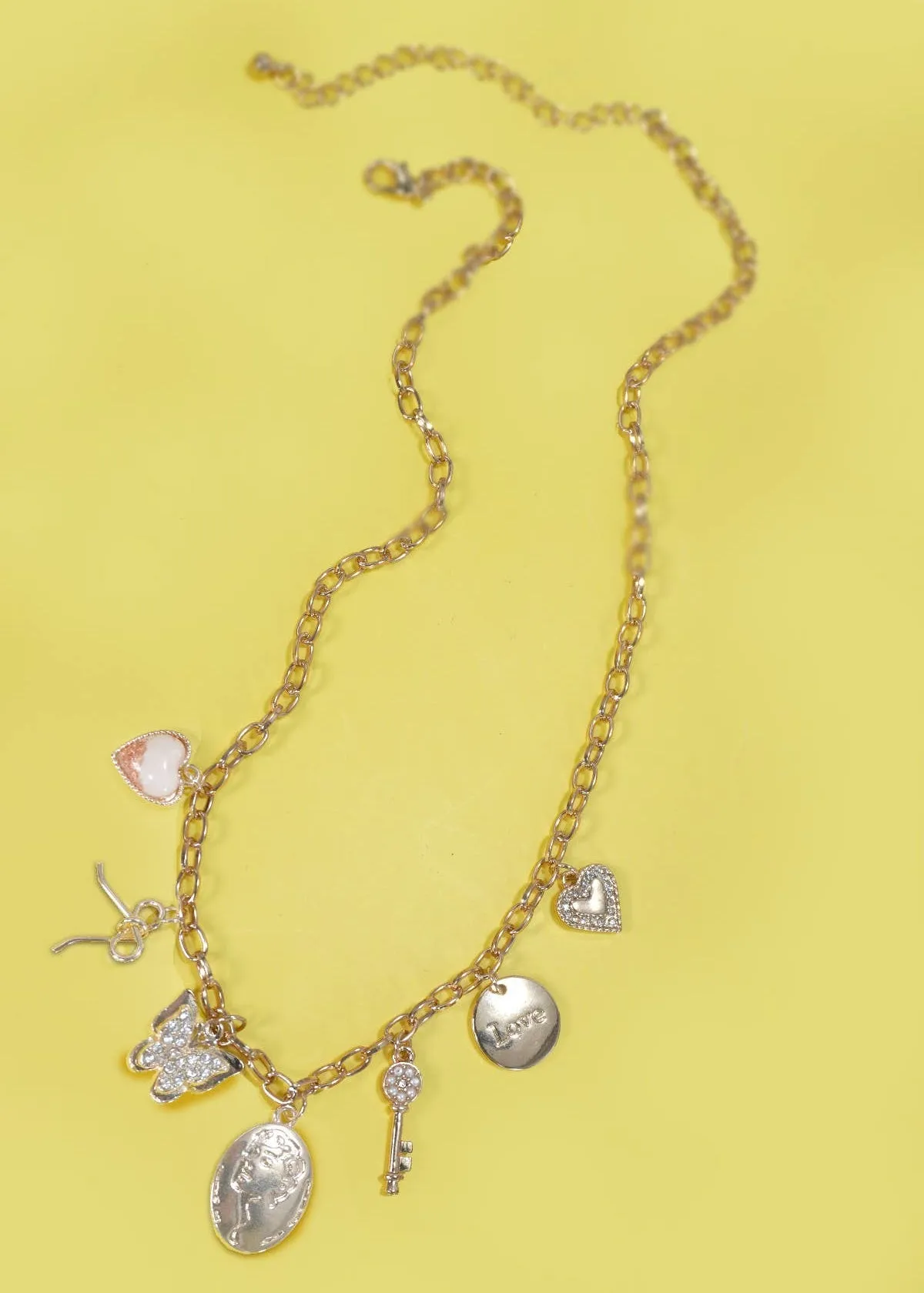 Love and Luck Gold 7-Charm Statement Necklace