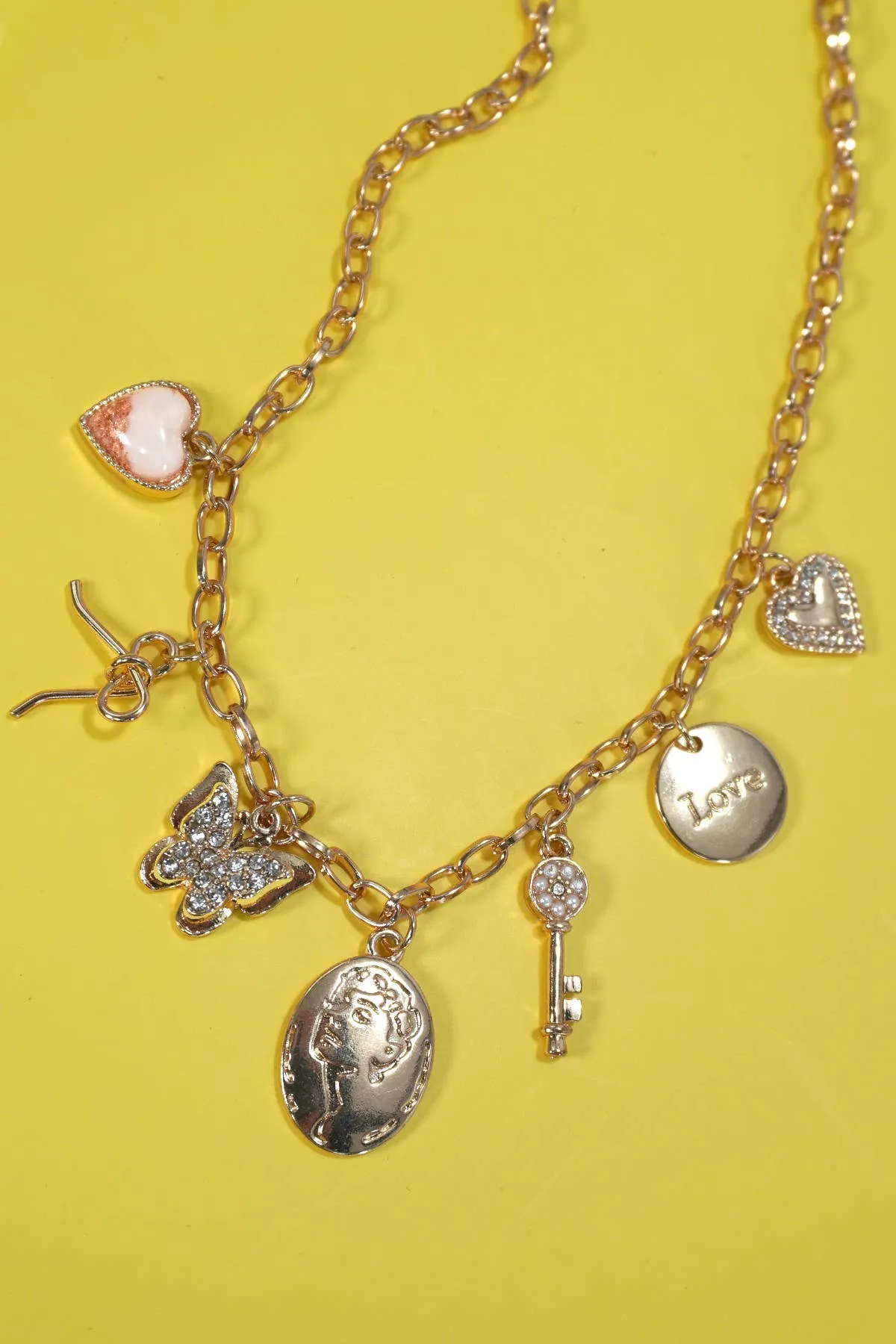 Love and Luck Gold 7-Charm Statement Necklace